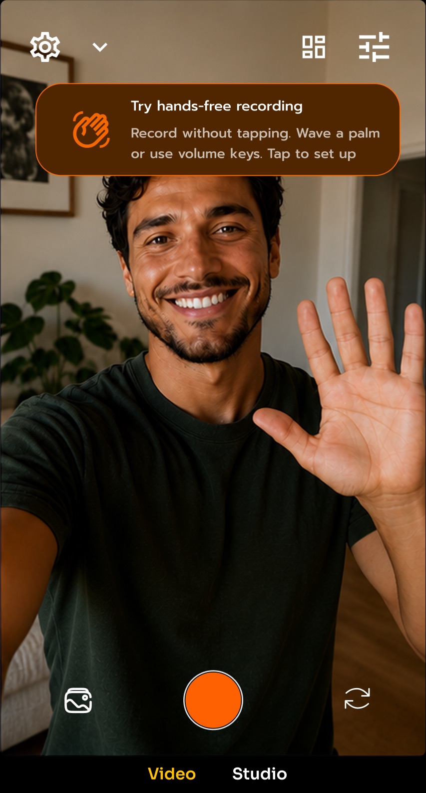 UnKover offering hands-free recording while the subject raises an open palm to the camera.